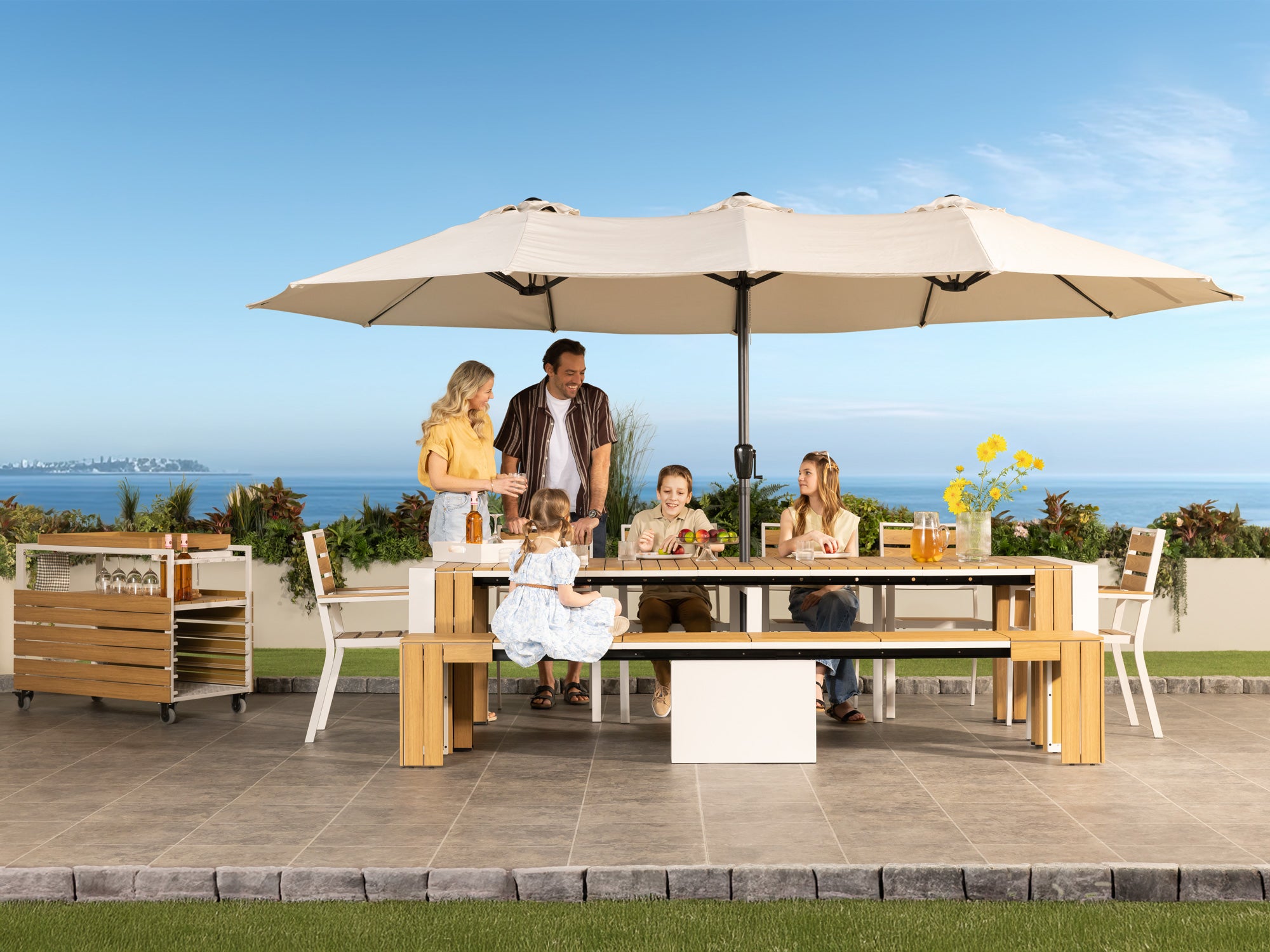 Transformer-outdoor-table-light-oak-the-host-6-chairs-5-panels-lifestyle-models Transformer Outdoor Patio Umbrella - Image 1